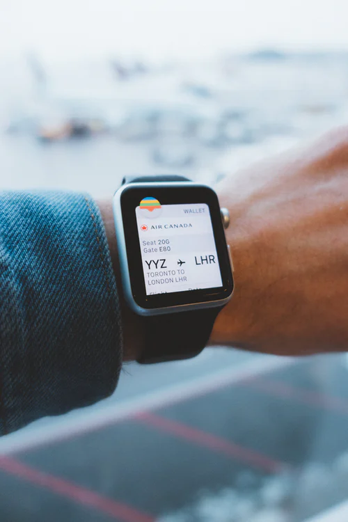 Can conversational AI improve user experience? Apple Watch with travel app open.