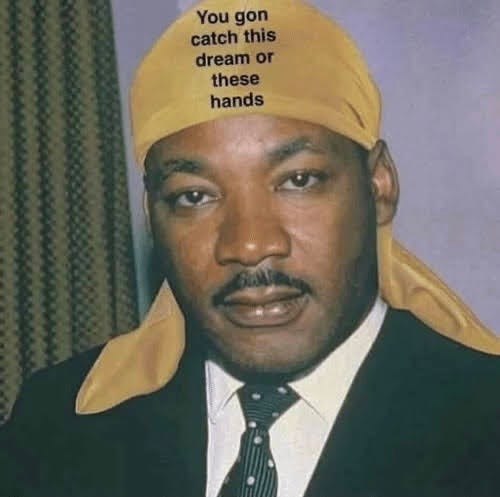 an edited picture of the late martin luther king jr. wearing a yellow durag that has the word “you gonna catch this dream or these hands”