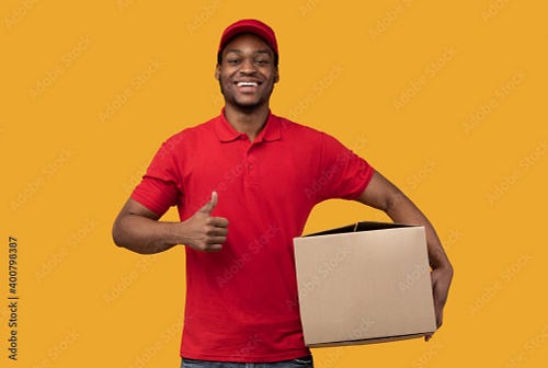 Smiling Black delivery man holding cardboard box