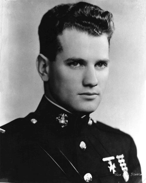 A black and white photo of George Cannon, US Marine Corps. He is wearing this dress uniform.