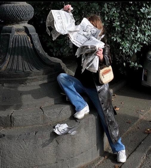 Liza Mikeladze posing with newspapers, Tbilisi 20/11/20. | Photographed by Mariami Gugushvili