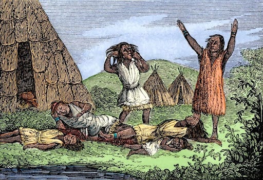 Several people stand, or lie, in panic or dead, respectively, in front of huts on a grass field.