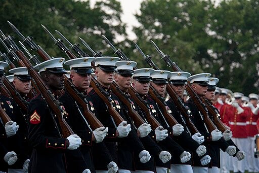 A photo of US Marines marching in formation.