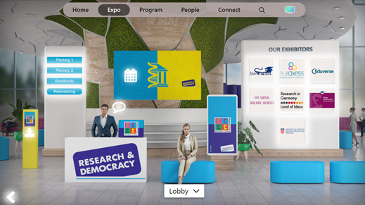 Picture of the virtual lobby, showing a person behind a welcome desk, and a screen with the event sponsors