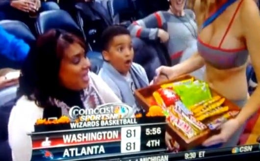 Kid Hawks fan goes crazy at cheerleader