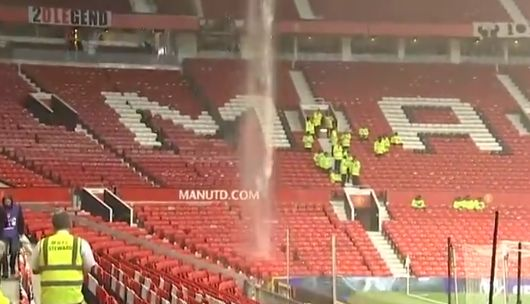 Heavy rainfall in the stadium due to a hole in the roof