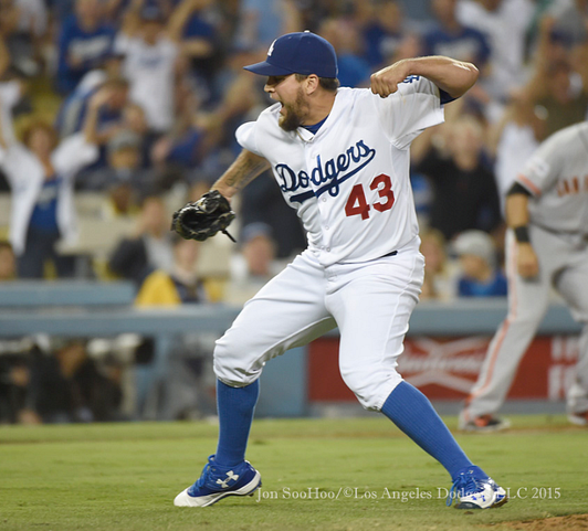 Luis Avilan celebrates after inheriting two runners on September 1 and getting out of the inning without allowing one to score. Jon SooHoo/Los Angels Dodgers