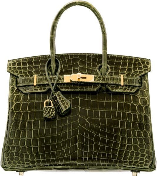 Crocodile skin Hermes Birkin bag with metallic forest green color.