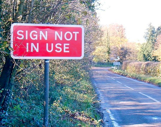 A road sign that says “sign not in use”.
