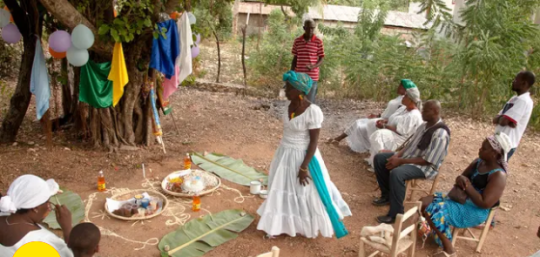 Image of a Vodou ceremony from a video of The Guardian