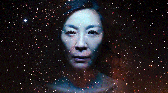 Clip of Michelle Yeoh’s face flashing between different timelines from the film “Everything Everywhere All at Once”
