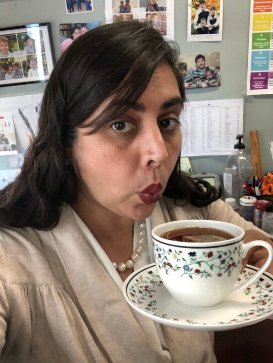 Professor Varyani cools her cup of tea