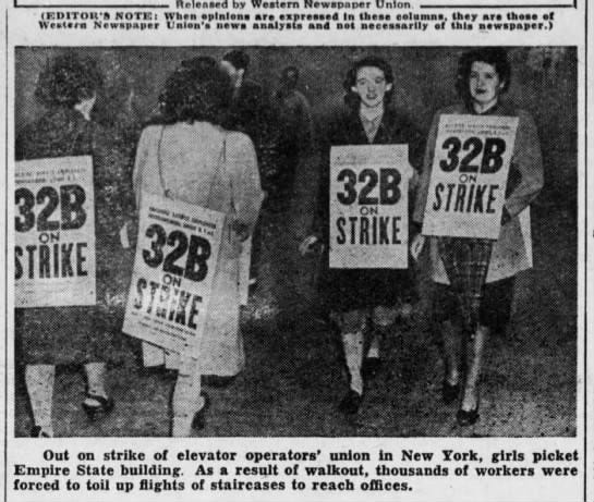 Pictured are a group of women holding 32B strike signs who appear to be picketing outside a Manhattan building.