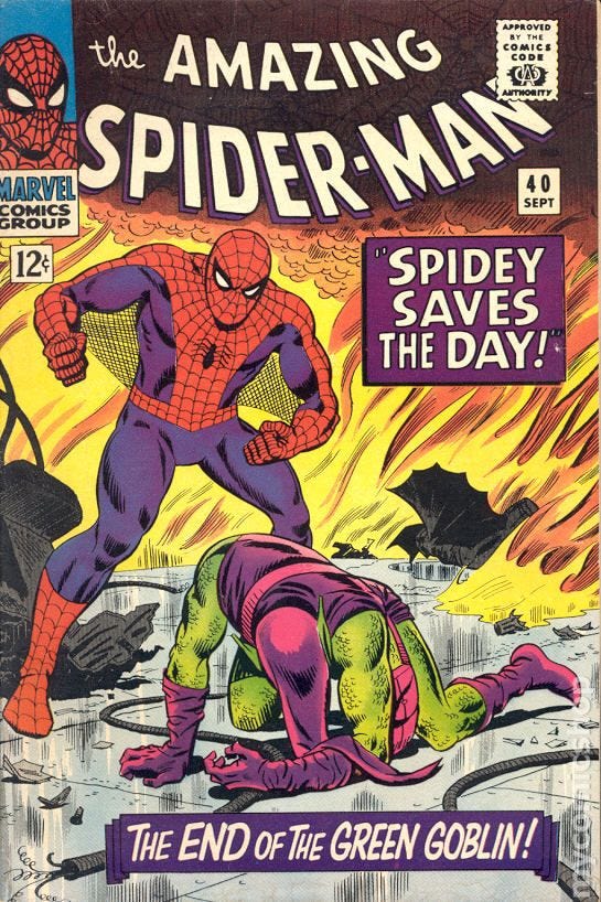 A comic book cover for the Amazing Spider-Man, depicting a triumphant Spider-Man over the defeated Green Goblin