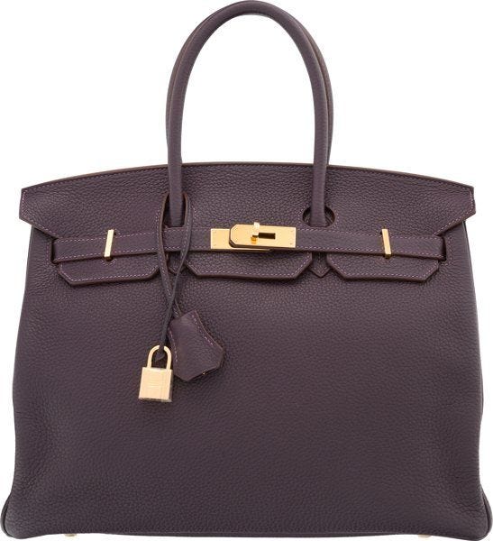 A raisin colored clemence leather birkin bag.