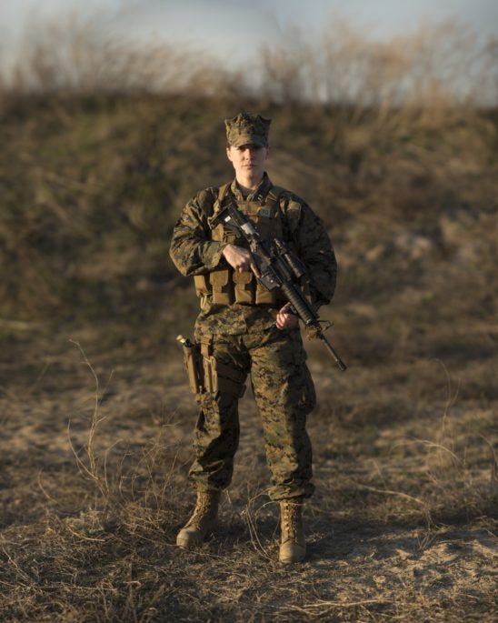 US Marine Capt. Rebecca Bergstedt is the officer in charge of a Female Engagement Team. ~Sgt. Matthew Callahan/US Marine Corps