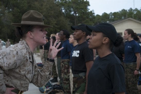 A future Lieutenant enjoys learning important leadership lessons from a Drill Instructor at Mini OCS Prep Weekend aboard Parris Island