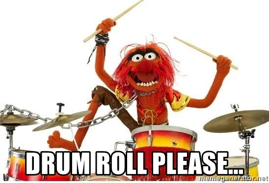 Mime of a muppet character playing drum set with a caption of Drum Roll Please