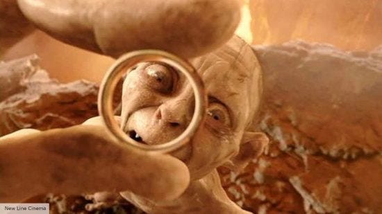 Gollum holding up The One Ring