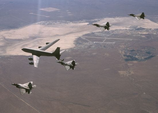 Figure 2.0: a USAF KC-135 refuelling a flight of F-22s. In the great expanse of the western pacific, tankers will be vital to allow shorter ranged combat aircraft to perform missions at long ranges