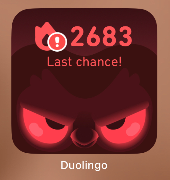 The Duolingo wiget of the brands owl, reminding you of your daily streak. It’s in a dark angry red, as the user is close to loosing their 2683 day streak.