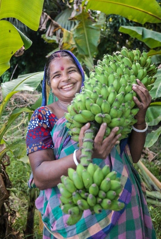 A Nobo Jatra participant celebrating her successful banana farming business. (Photo: Nobo Jatra)