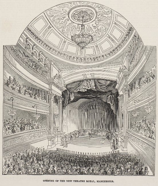 Cast and audience inside Manchester’s elaborately decorated third Theatre Royal on opening night, lit by chandeliers.