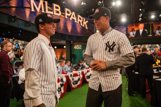 Ian Clarkin jokes with Fresno State University outfielder and 32nd overall selection Aaron Judge. Photo by Paige Calamari/MLB Photos