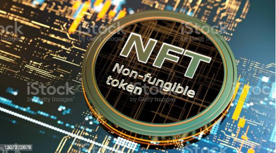 The word Non-Fungible Token on a crypto coin