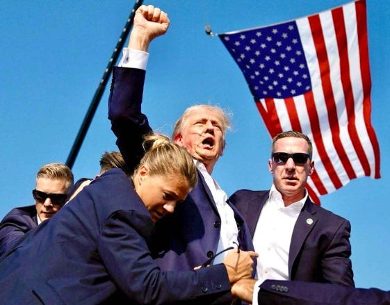 Trump, fist high after attempted assassination