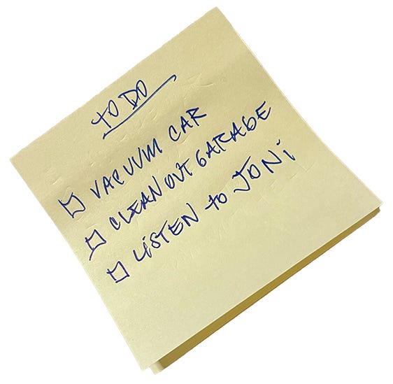 Post-It note with a to do list written on it