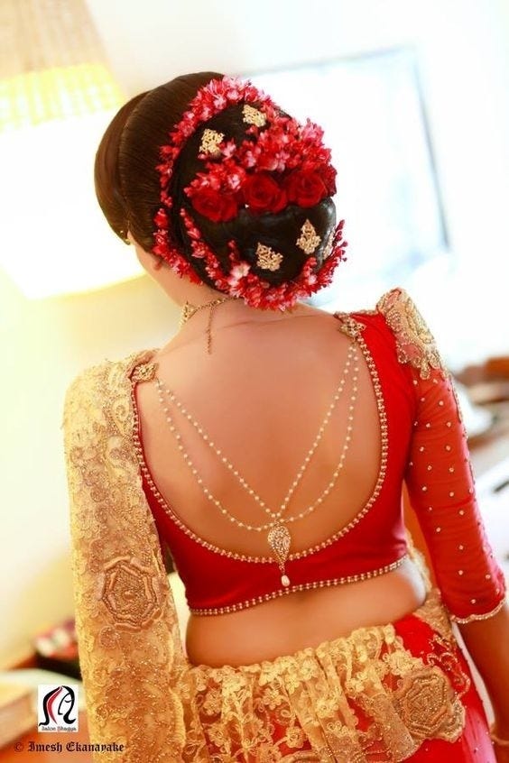 red blouse design with pearl