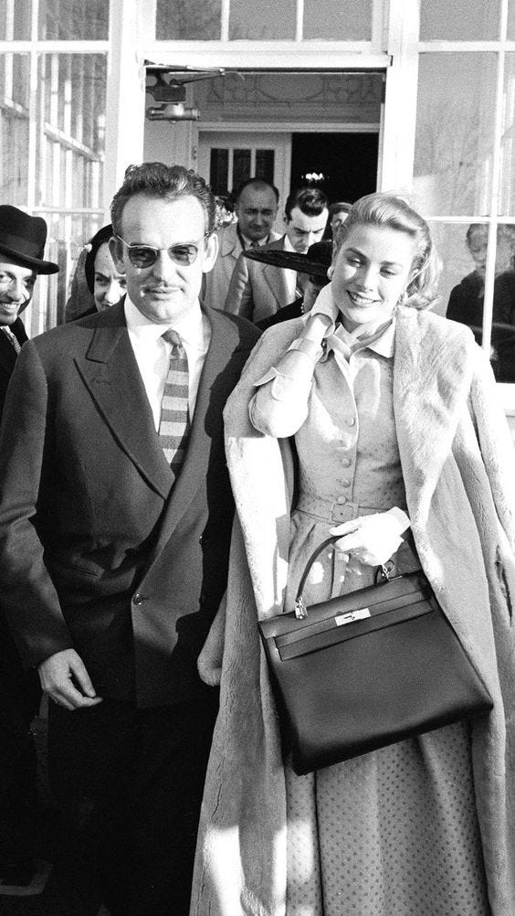 A photo of Grace Kelly with her namesake bag.