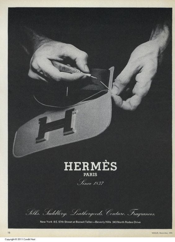 Hermes ad showing a man stitching with just his hands showing