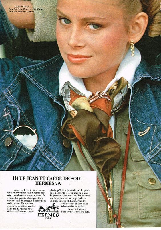 1979 ad of Hermes with woman wearing a denim jacket and Hermes scarf