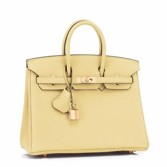 A lemon yellow Birkin bag made from togo leather.
