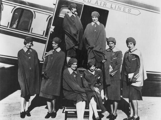 The first group of airline flight attendants, hired by United Airlines in 1930. Ellen Church, the very first flight attendant, is seated with her legs crossed. (Photo courtesy of Association of Flight Attendants)