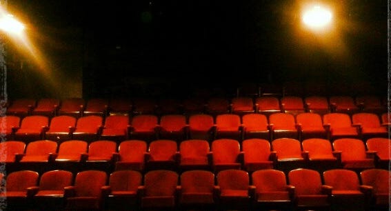 Empty seats in a theatre.