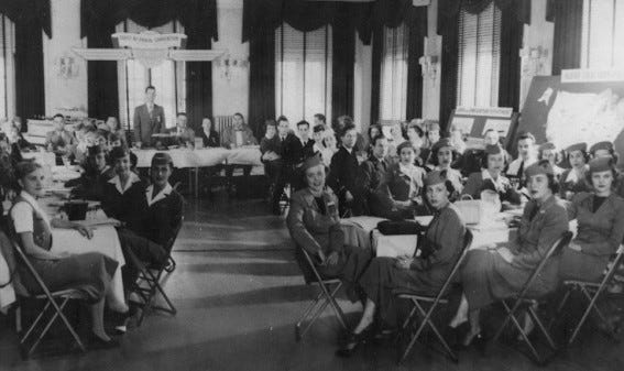 United Airlines flight attendants attend their first training conference, where they studied in-flight safety, passenger service, geography and etiquette. These pioneering professionals helped define the standards of commercial air travel. (Photo courtesy of Association of Flight Attendants)