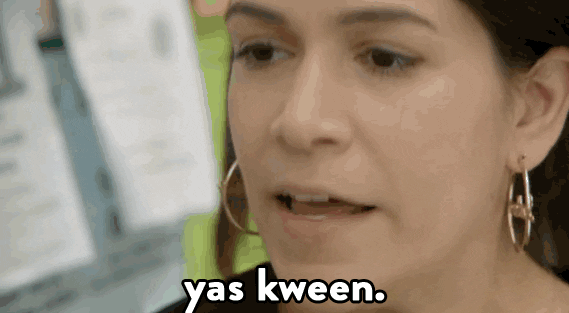 A gif of Ilana and Abbi from Broad City saying “Yas Kween” back and forth to each other, ending with Ilana slapping Abbi.