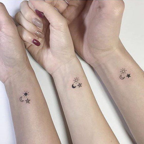 10 Best Friend Tattoos Designs For You And Your Wonderful Pal - sun moon and saturn tattoobr /
