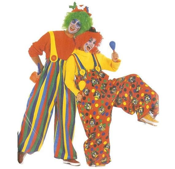 Two clowns with, shall we say, “loud” pants.