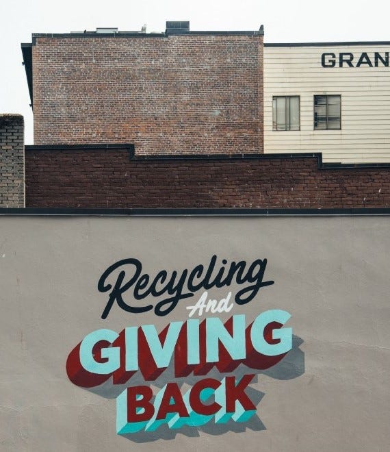 Wall Street Art Text “Recycle and Giving Back”