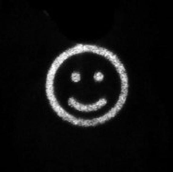 A black and white smiley face