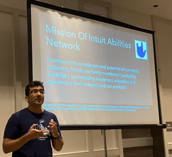 Sagar Barbhaya presenting with backdrop slide stating Mission of Intuit Abilities Network