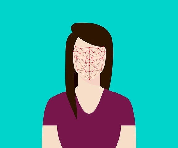 Face if women covered with electronics/grid pattern such as used in face recognition.