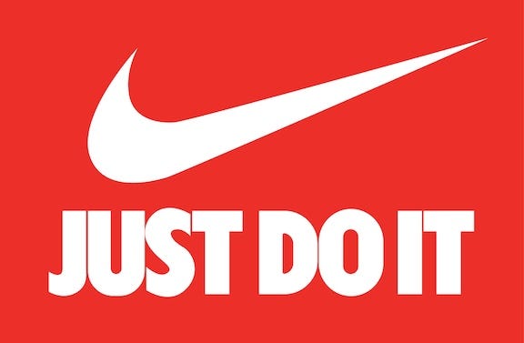 Nike swoosh logo with the phrase “just do it” written beneath it in block captiral letters.