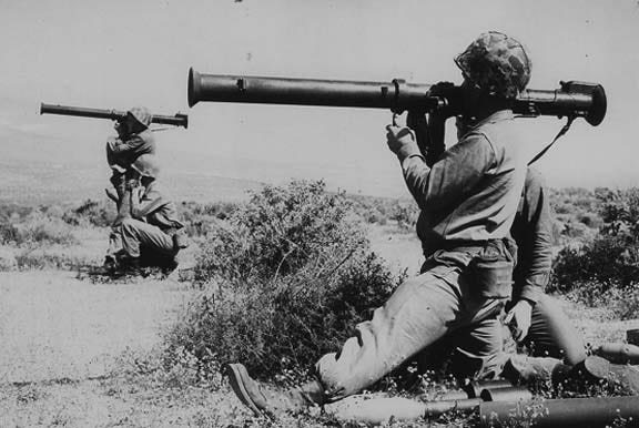 photo of two soldiers with bazooka guns