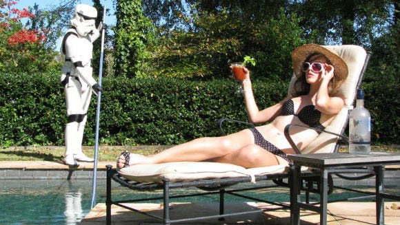 A Stormtrooper cleaning a pool