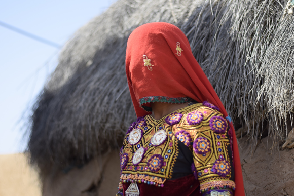 A woman wearing a mukka embroidered kanchali (blouse).